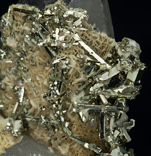 Pyrite on Quartz with Siderite. 