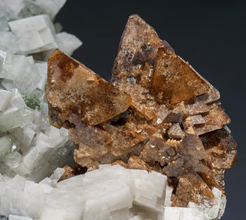 Genthelvite with Magnetite, Quartz, Fluorite, Arsenopyrite, Calcite-Dolomite. 