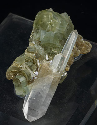 Fluorapatite with Quartz, Arsenopyrite and Muscovite. 