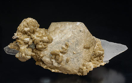 Siderite with Quartz, Chalcopyrite and Muscovite. 