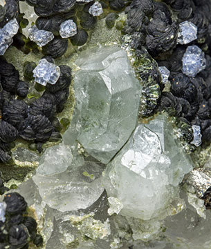 Fluorite with Topaz, Quartz, Arsenopyrite and Muscovite. 