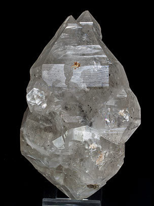 Doubly terminated Quartz with hydrocarbon inclusions and Baryte. Front