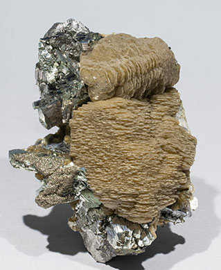 Siderite with Arsenopyrite, Pyrite and Muscovite. Side