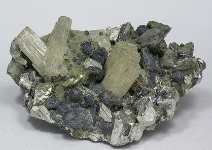 Fluorapatite with Arsenopyrite, Chlorite and Quartz. 