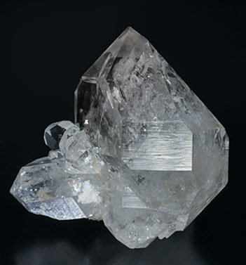 Quartz (doubly terminated) with hydrocarbon inclusions. Rear