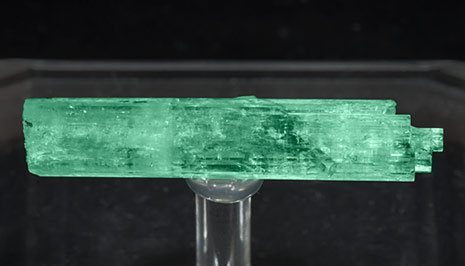 Doubly terminated Beryl (variety emerald). With light behind