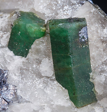 Beryl (variety emerald) with Molybdenite and Quartz. 