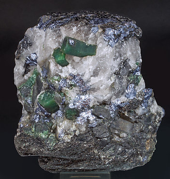 Beryl (variety emerald) with Molybdenite and Quartz. Front