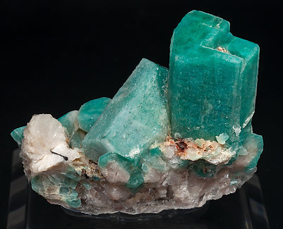Microcline (variety amazonite) with Albite and Schorl. Front