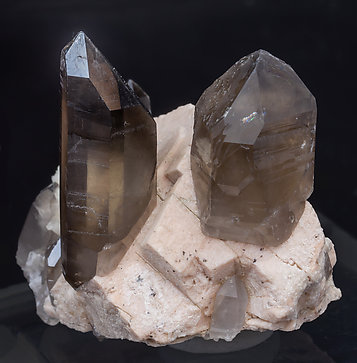 Quartz (variety smoky) with Microcline and Albite. Side