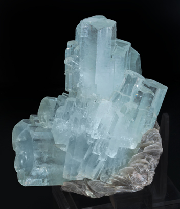 Beryl (variety aquamarine) with Muscovite. Side