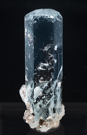 Beryl (variety aquamarine) with inclusions, Schorl and Albite.