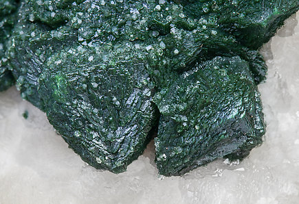 Malachite after Cuprite with Calcite. 