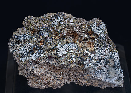 Yuanfuliite with Hematite, Calcite and Diopside. 