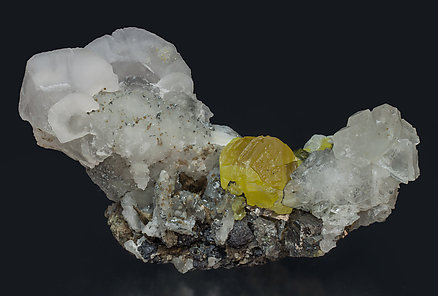 Sphalerite with Calcite, Quartz, Arsenopyrite and Sphalerite. 