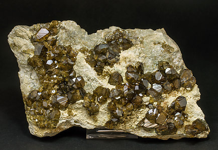 Andradite (variety topazolite) with Calcite. Front