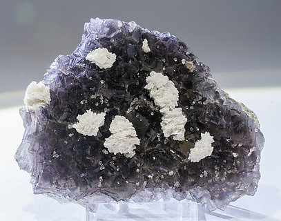 Fluorite with Dolomite and Quartz. Light behind