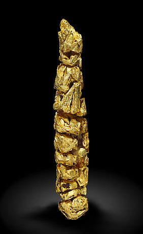 Oro (macla de la espinela). Vista lateral / Foto: Joaquim Calln