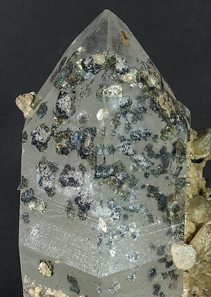 Quartz with inclusions of sulphides and with Siderite, Sphalerite, Marcasite and Muscovite. 
