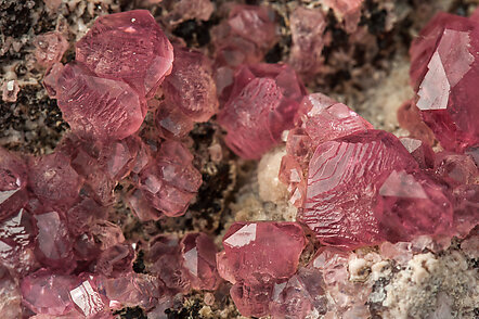 Rhodochrosite with manganese oxides. 
