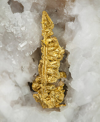 Gold (spinel twin) on Quartz. 