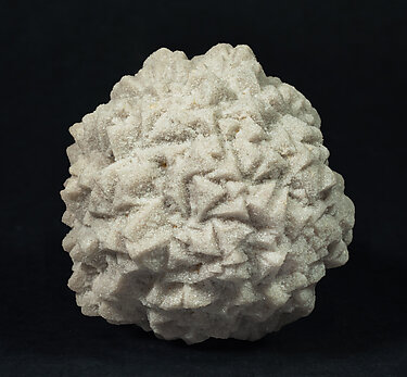 Calcite with sand inclusions.