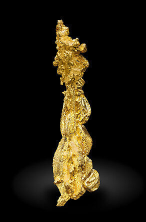 Oro (macla de la espinela) con Calcita. Vista posterior / Foto: Joaquim Calln