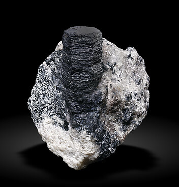 Hibonite with Corundum, Calcite and Diopside.