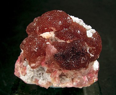 Elbaite (variety rubellite) with Quartz. 