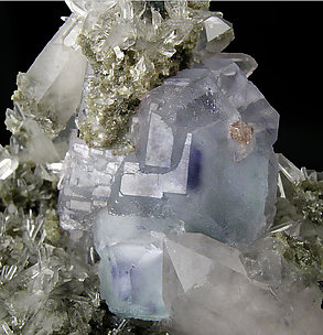 Octahedral Fluorite with Quartz, Ferberite and Muscovite. 