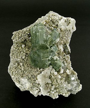 Fluorapatite with Calcite and Muscovite. 