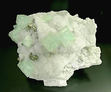 Fluorite with Quartz, Pyrite and Calcite. 