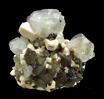 Fluorita con Cuarzo ahumado, Orthoclasa y Hematites. 