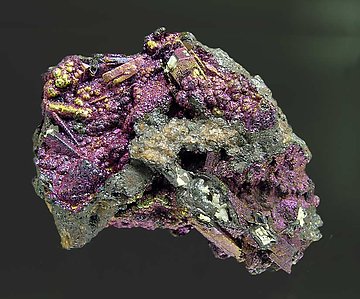 Cerussite after Anglesite with Goethite. 