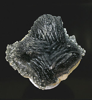 Calcite with Boulangerite inclusions. Rear