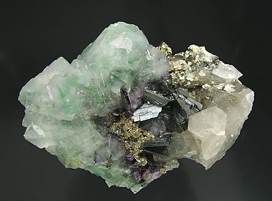 Octahedral Fluorite with Ferberite, Quartz and Pyrite.