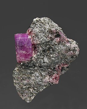 Corundum (variety ruby) with Pyrope (variety rhodolite) and Muscovite. Front