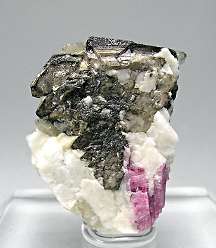 Schiavinatoite with Elbaite, Danburite and smoky Quartz. Front