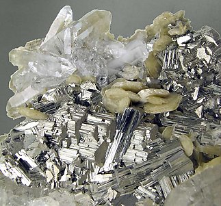 Arsenopyrite with Quartz and Siderite. 