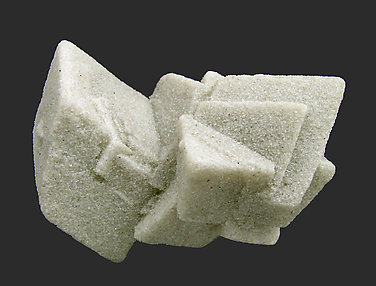 Calcite with inclusions of sand.