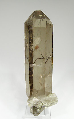 Quartz (variety smoky) with inclusions and Chlorite. 