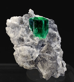Beryl (variety emerald) on Calcite. front