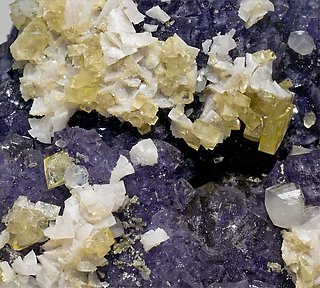 Fluorite with Calcite, Baryte and Dolomite. 