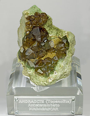 Andradite (variety topazolite) with Quartz. Front