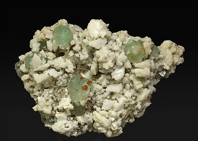 Fluorite with Albite (Pericline), Spessartine and Muscovite. 