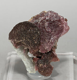 Elbaite (variety rubellite) with Quartz and Schorl. 