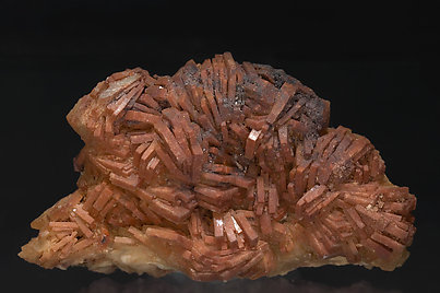 Baryte with inclusions of Hematite. 