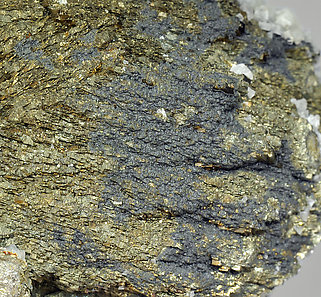 Arsenopyrite with Stannite, Calcite and Pyrite. 