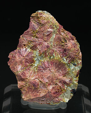 Clinozoisite (variety clinothulite) with Grossular and Quartz. 