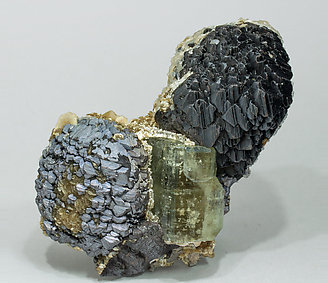Fluorapatite with Sphalerite, Muscovite, Calcite, Siderite and Pyrite. Side